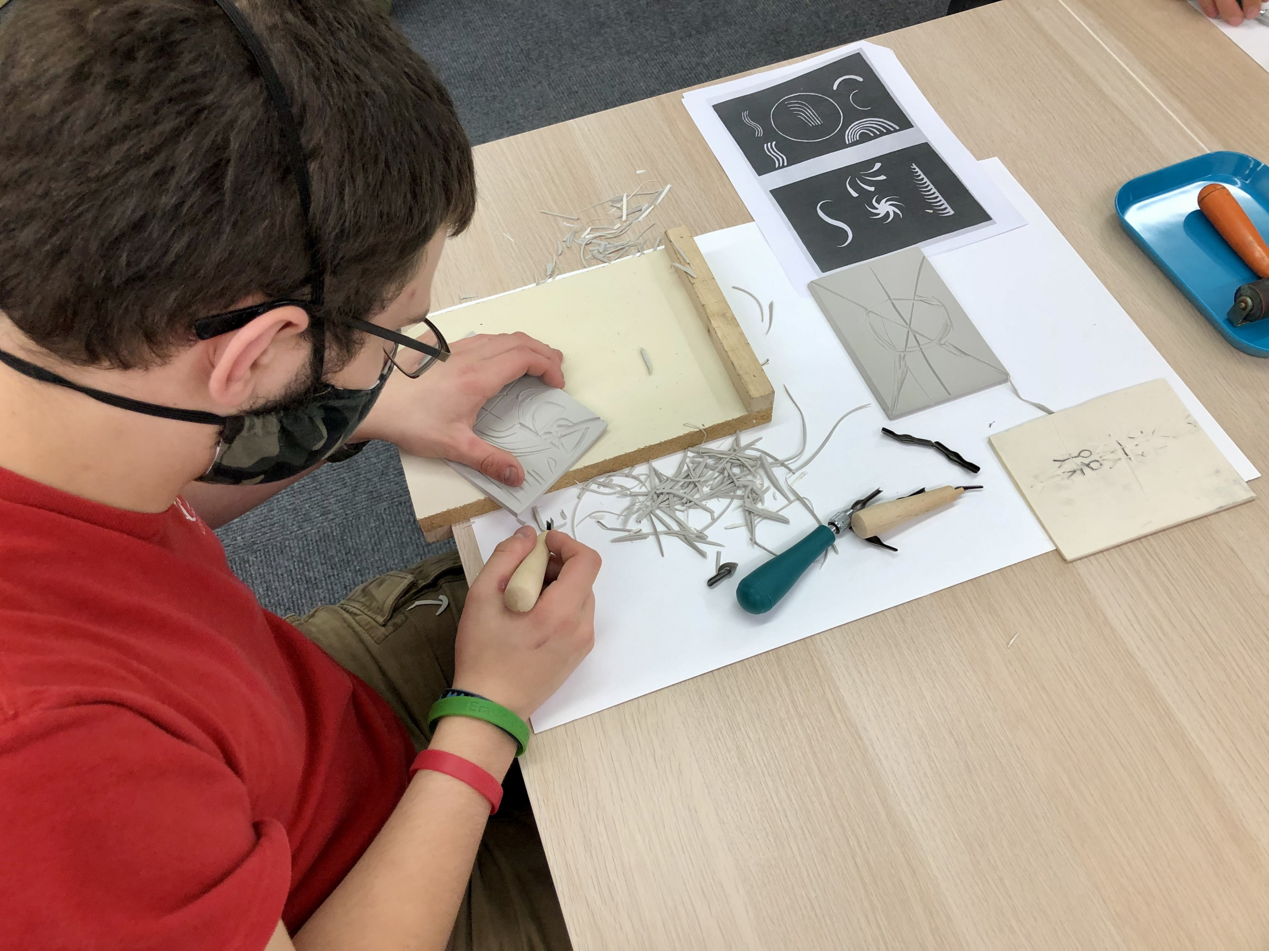 Students making art with hands-on materials