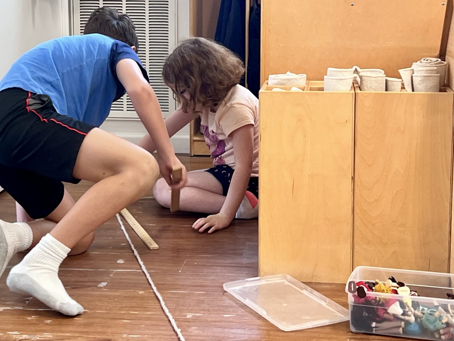 Students working on a building project in the classroom