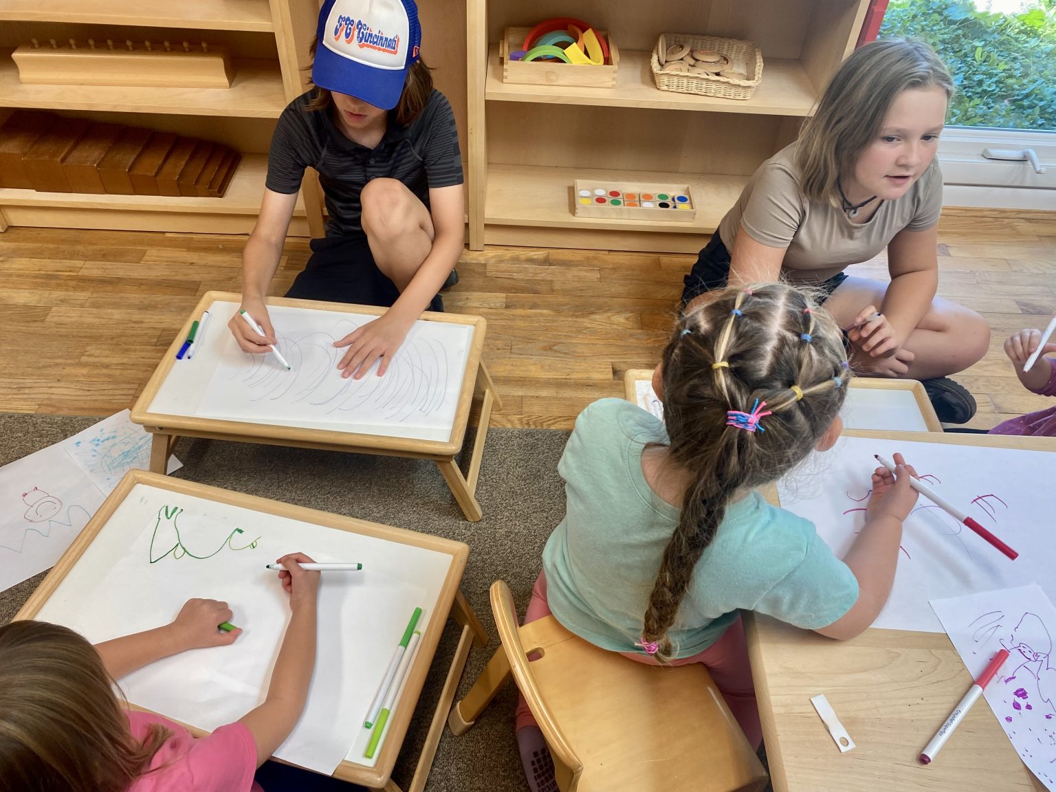 Lower Elementary students writing