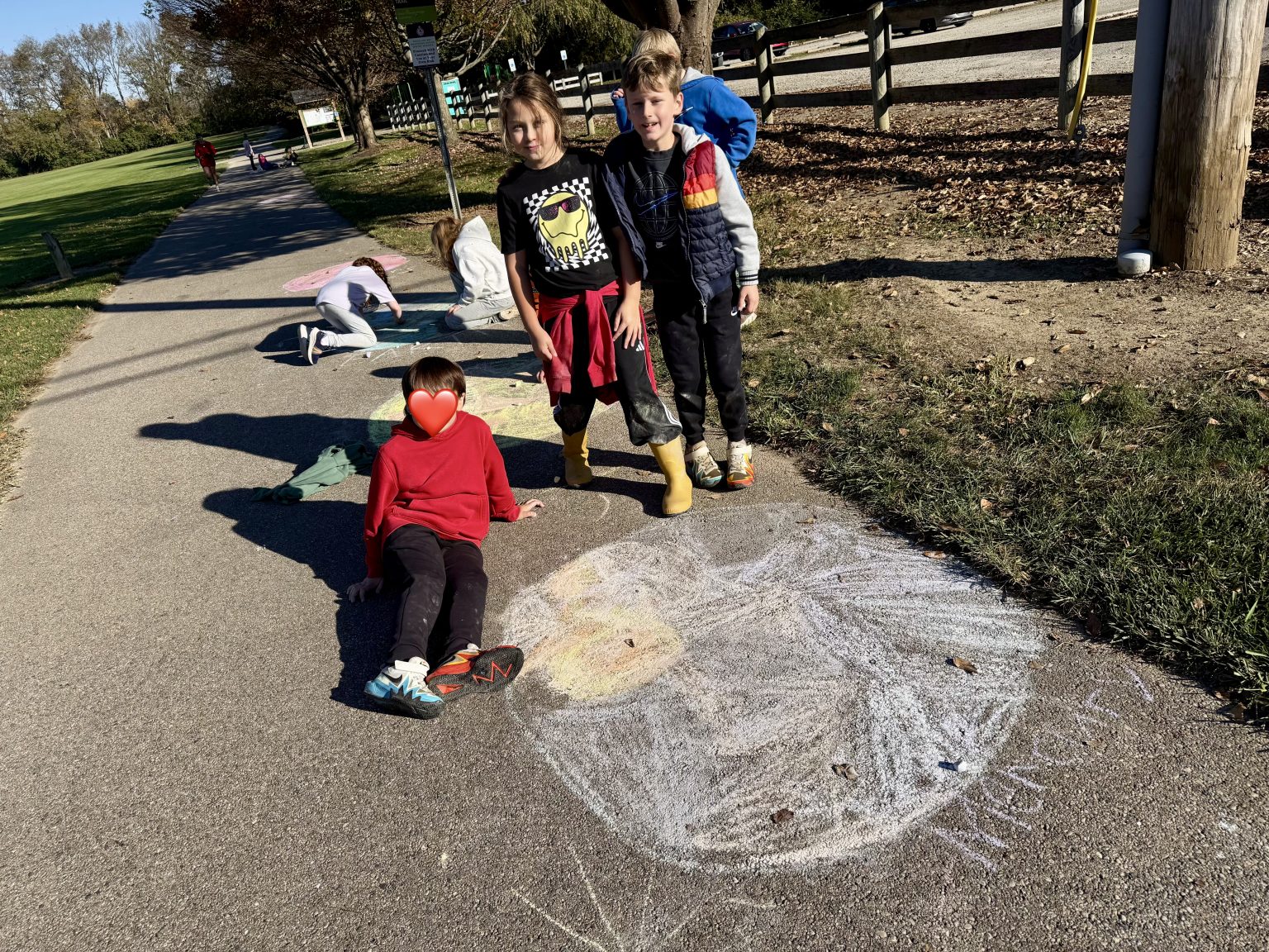 Children playing together on an outdoor path