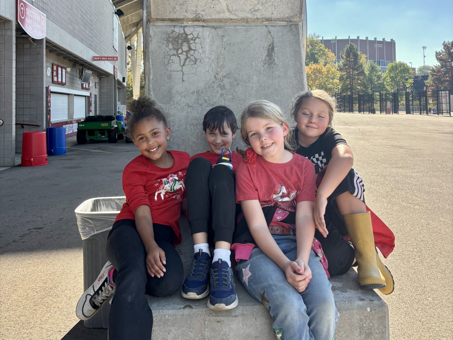 A group of McGuffey students sitting together on a field trip